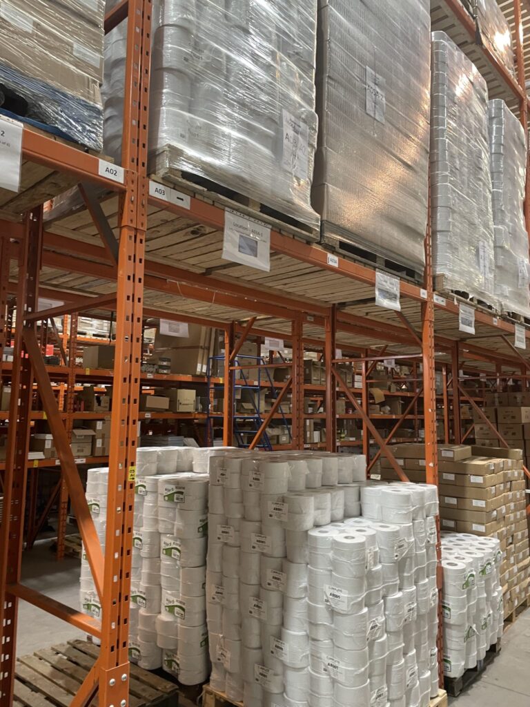 Pallet racking holding wrapped inventory by SKU